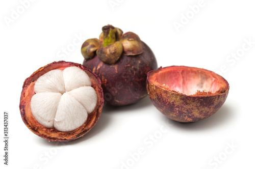 Closeup of purple mangosteen on white background