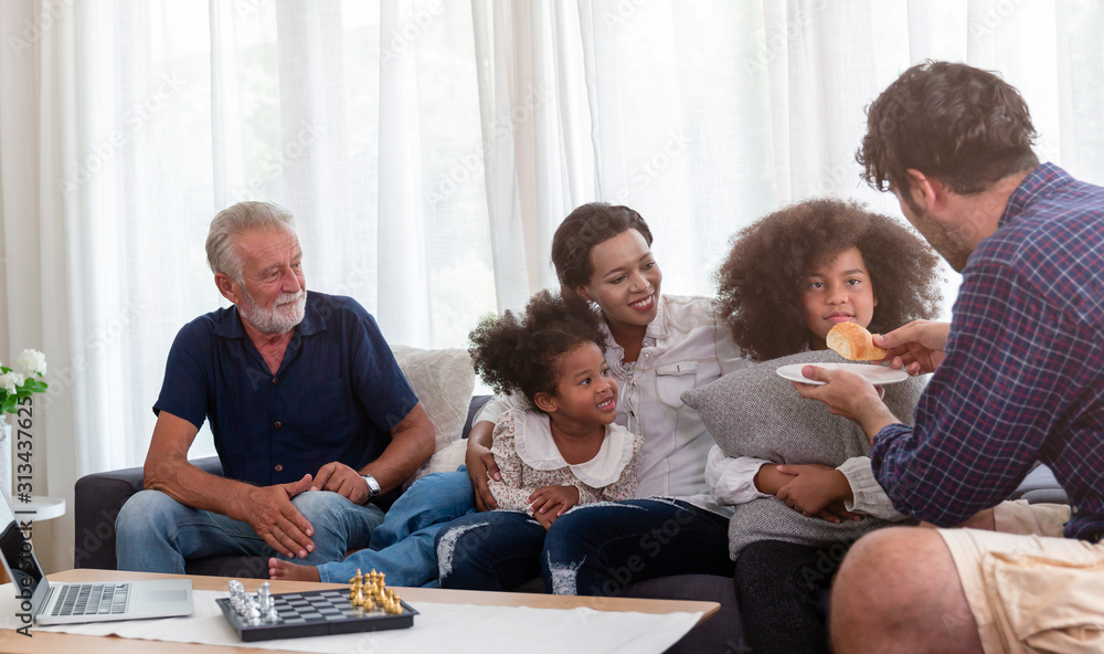 Happy Family with children spend time together in the living room at home. Happy Family with children spend time together in the living room at home.