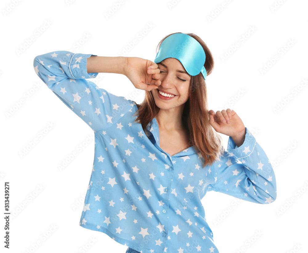 Beautiful woman wearing pajamas and sleep mask on white background. Bedtime Beautiful woman wearing pajamas and sleep mask on white background. Bedtime