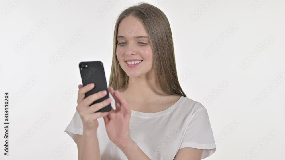 Beautiful Young Woman Talking on Smartphone, White Background Beautiful Young Woman Talking on Smartphone, White Background
