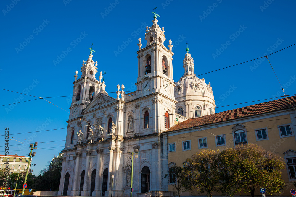 LISBON, PORTUGAL - MAY, 2018: The Estrela Basilica or the Royal Basilica and Convent of the Most Sacred Heart of Jesus in Lisbon