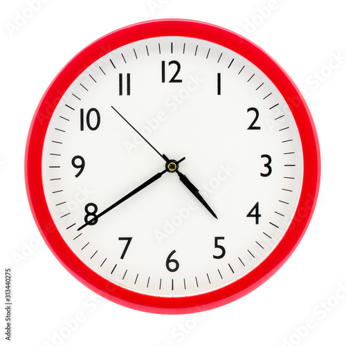 The clock with white dial and red frame shows 16 (4) hours 40 minutes_