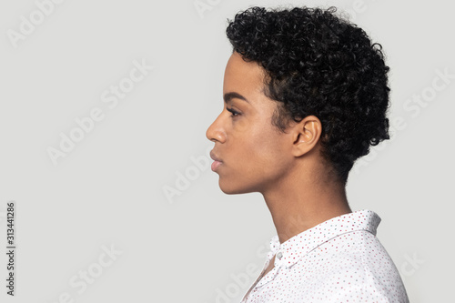 Quadro em tela African woman profile side closeup face isolated on grey background