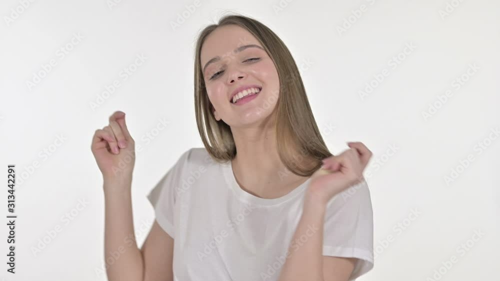 Happy Beautiful Woman Dancing to Music, White Background