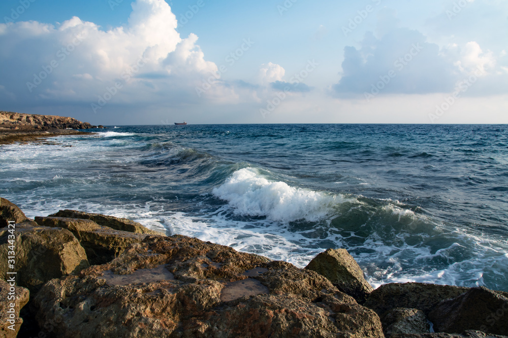Seascape waves with foam of the Mediterranean Sea
