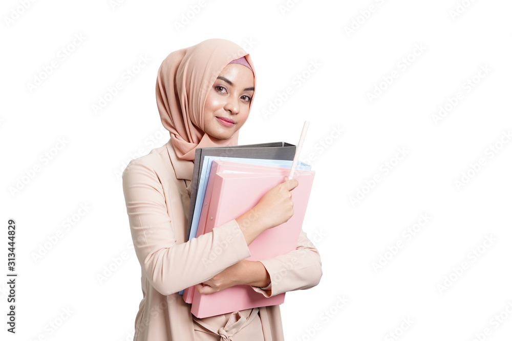 Young Asian Muslim Business Woman holding the business document isolate on white background. Young Asian Muslim Business Woman holding the business document isolate on white background.