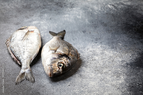 Fresh uncooked Dorado or sea bream fish