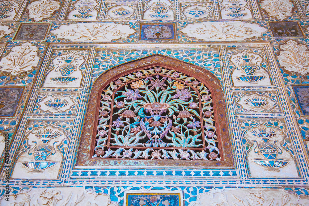 Agra, India -  marble and mirrors on wall in Hall of thousands mirrors, Amber Fort near Jaipur, Rajasthan, India. Unesco World Heritage Site