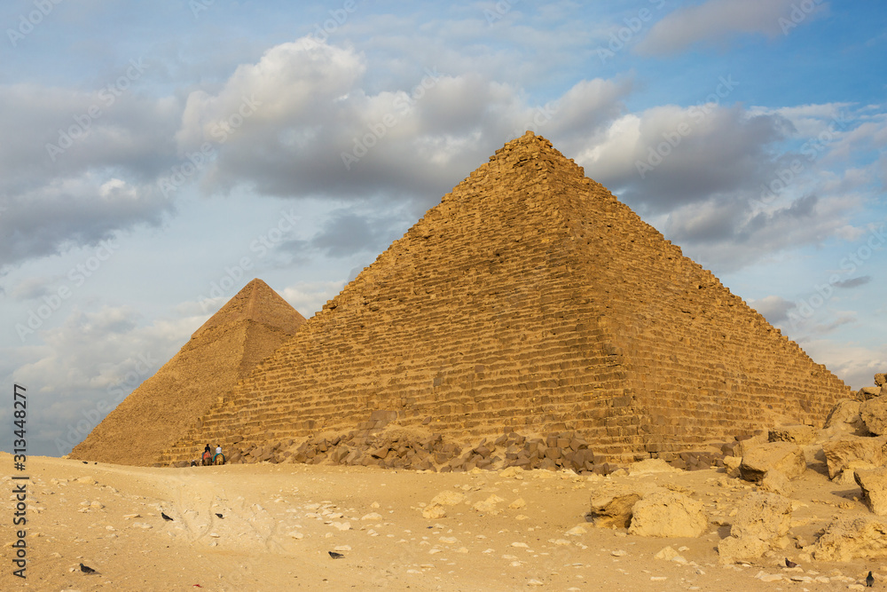 Famous great Giza Pyramids in sand desert in Cairo. Famous great Giza Pyramids in sand desert in Cairo.