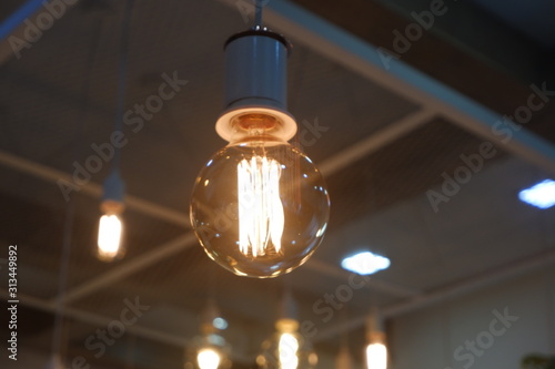 closeup light bulb electricity idea innovation symbol