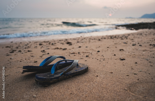 sandals on sunset beach
