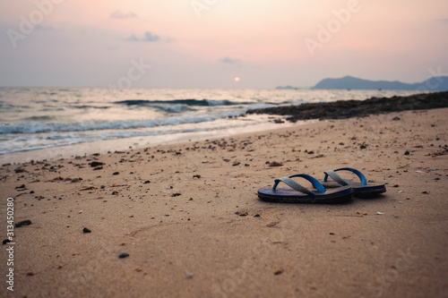 sandals on sunset beach