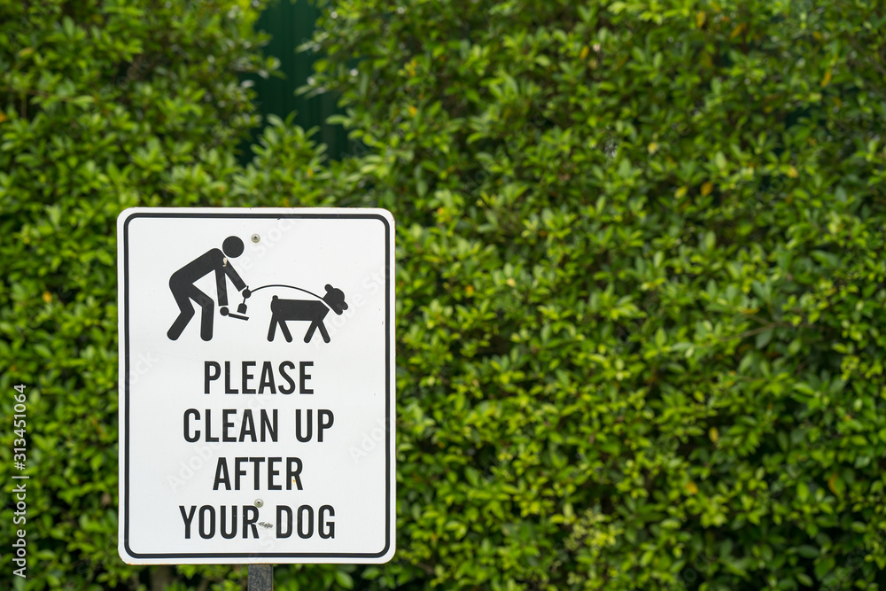 Clean up your dog sign at park.