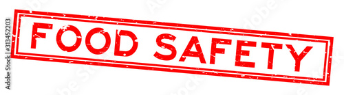 Grunge red food safety word rubber seal stamp on white background