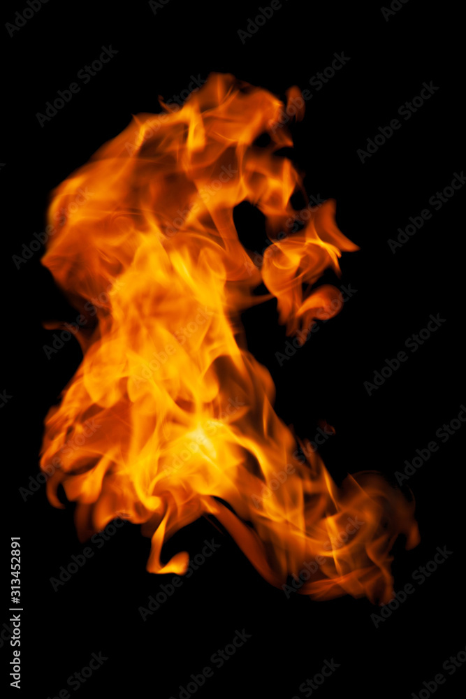 Fire and burning flame isolated on dark background for graphic design purpose Fire and burning flame isolated on dark background for graphic design purpose