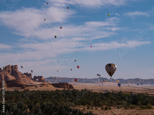 Winter at Tantora Hot Air Balloon Festival over Mada'in Saleh (Hegra) ancient site, Al Ula, Saudi Arabia