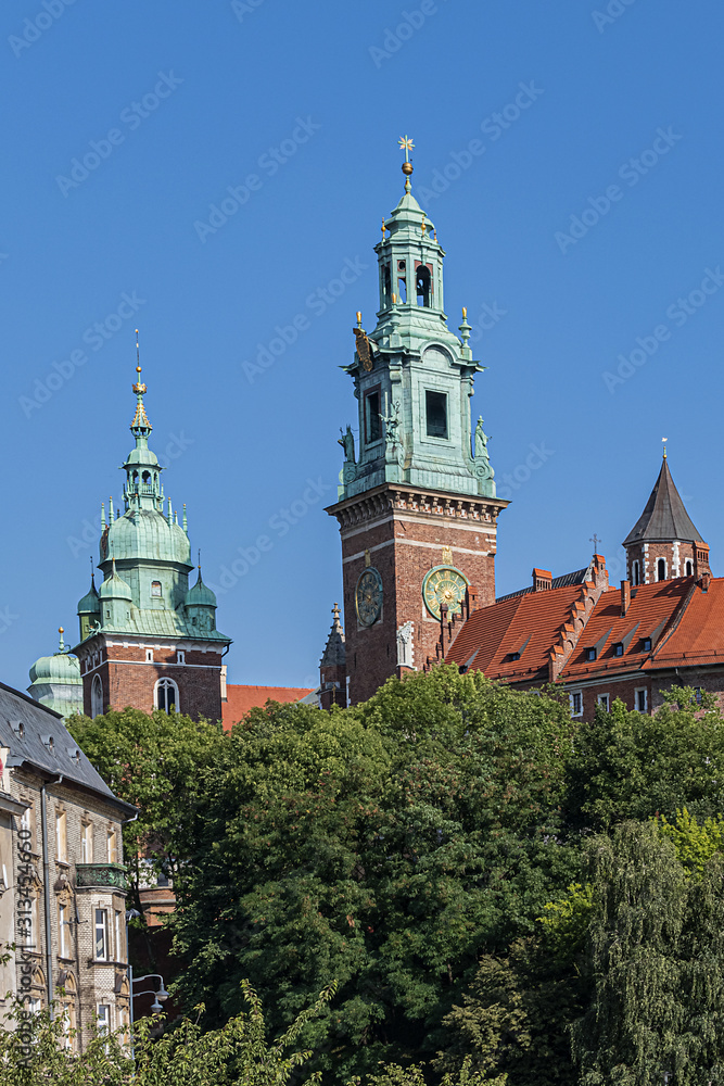 Architectural fragments of Wawel Cathedral (Katedra Wawelska, from 11th century) bell tower in Krakow. Wawel Cathedral - Roman Catholic Church located on Wawel Hill in Krakow, Poland.