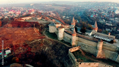 Sunrise above Kamianets-Podilskyi fortress, Ukraine photo