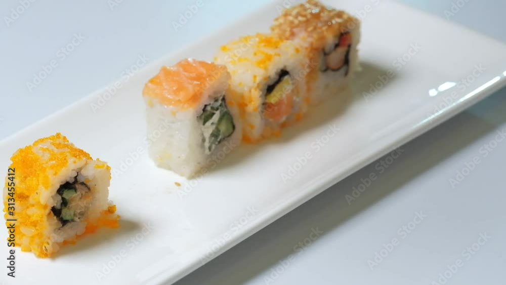 Sushi roll set on white background. Sushi Japanese food in restaurant. traditional rice. Sushi roll set on white background. Sushi Japanese food in restaurant. traditional rice.