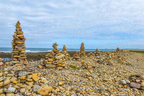 towers made of stones on the beach