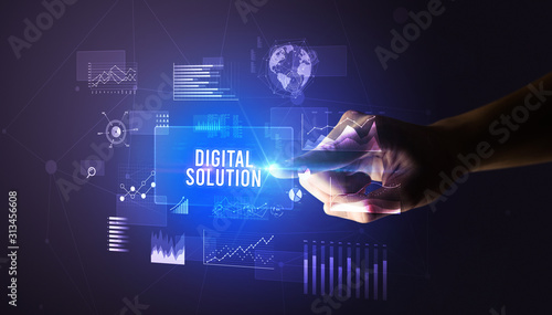 Hand touching DIGITAL SOLUTION inscription, new business technology concept