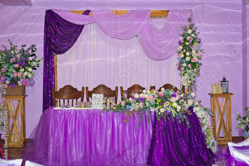 decorations for the wedding ceremony in purple colors