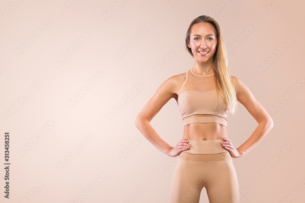 Indoor Yoga Classes. Sports recreation. Beautiful young woman in asana  pose. Individual sports. Nude sportswear. Stock Photo | Adobe Stock