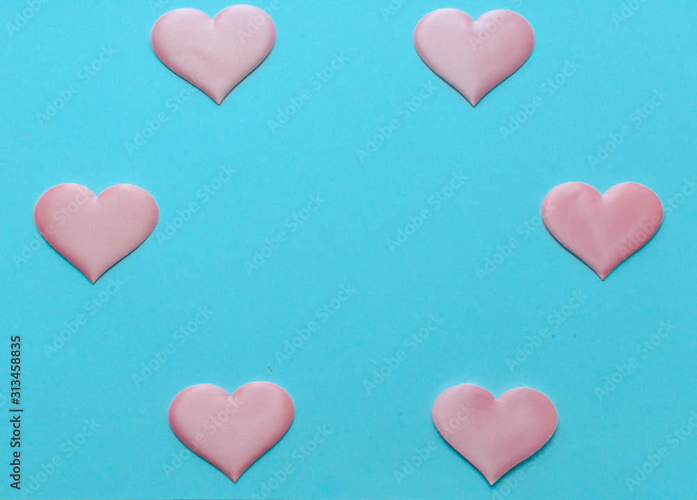 Valentine's Day background. A pink  heart  on blue background, flat lay minimal concept, trendy pop art style photo. Valentines day concept. Flat lay, top view, copy space