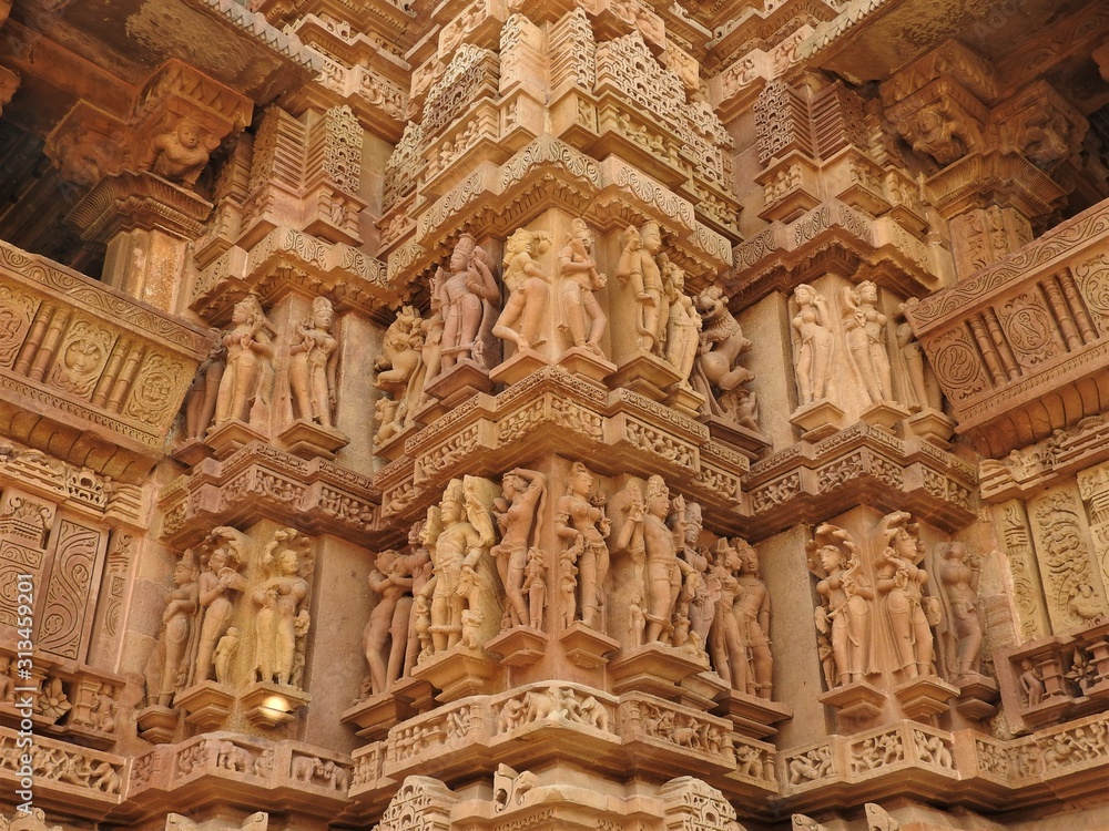 Erotic sculptures and sex poses of man in kajuraho temples, Madhya Pradesh, India. Built around 1050, it is a UNESCO world heritage site, a tourist destination. The concept of textures and postcards.