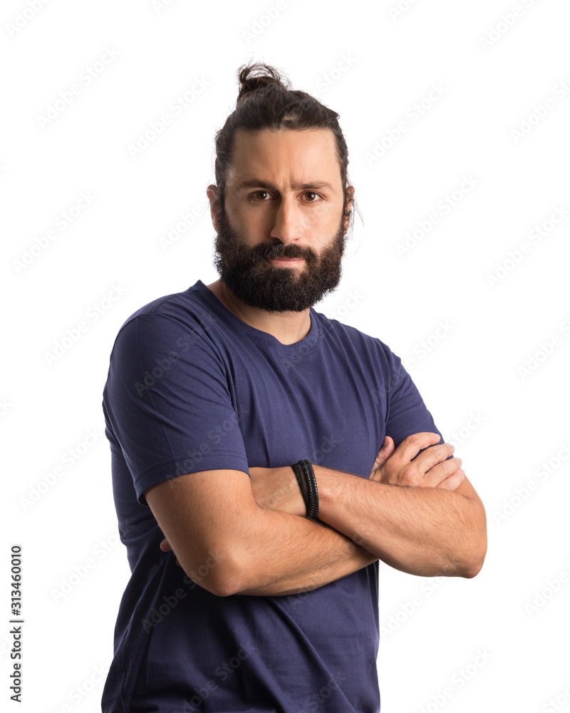 portrait of with arms crossed and serious expression. Standing against white background. portrait of with arms crossed and serious expression. Standing against white background.