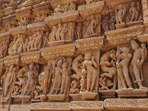 Erotic Human Sculptures at Vishvanatha Temple, Western temples of Khajuraho, Madhya Pradesh, India. Built around 1050, Khajuraho is UNESCO World heritage site and is tourist destination for erotica.