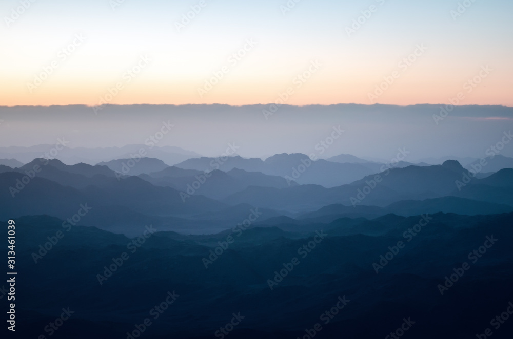 View from the mountain of Moses, a beautiful sunrise in the mountains of Egypt View from the mountain of Moses, a beautiful sunrise in the mountains of Egypt
