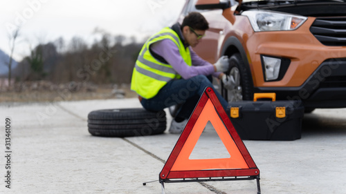 A close-up emergency stop sign. Road safety concept in case of emergency stop