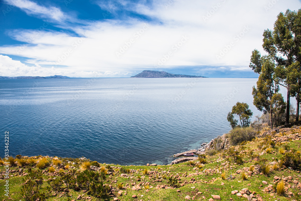 Panoramic view from Village on Taquile island in Titicaca lake, Peru.