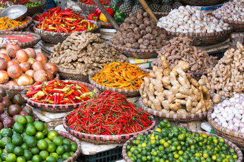 Bunches of fruits and spices at a market