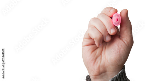 Man hold a pink highlighter on white background