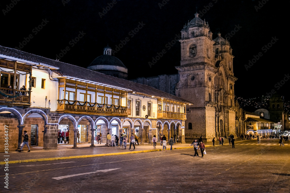 Historic Colonial Buildings on the Plaza de Armas Square with Many Visitor at Night, Cusco, Peru, South America,