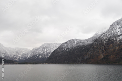 Scenic morning view on famous mountain town Hallstatt and Hallstatter Lake in the Austrian Alps. Location place: Hallstatt, Salzkammergut, Austria surrounded by Dachstein Alps. Nature concept