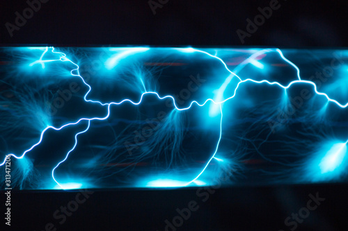 Photos Inert gas plasma blue discharge lightning
