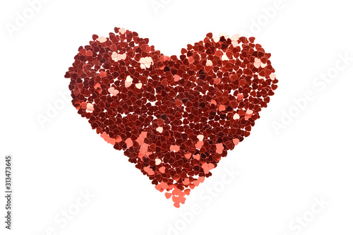 Red sequins heart shape symbol on white background. February 14, Valentines day luxury and glamour greeting card isolated design element. Shiny glitter love and romance creative decoration