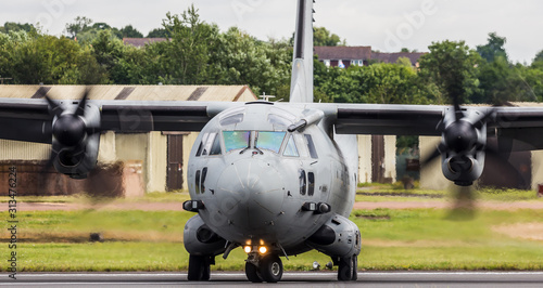 C-27 Spartan turning on the runway photo