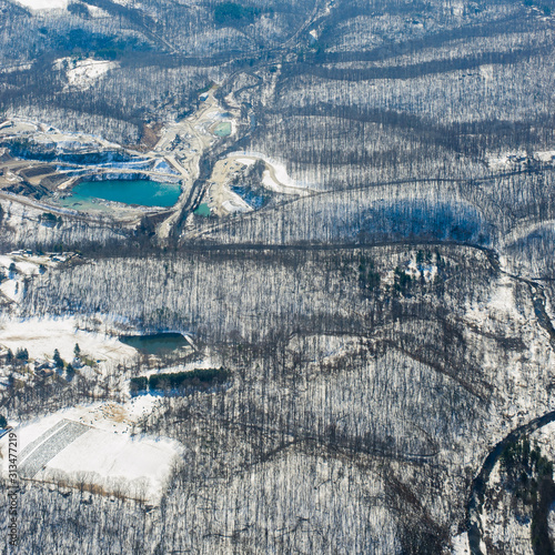 Aerial view of snow-covered landscape during winter in northeast USA