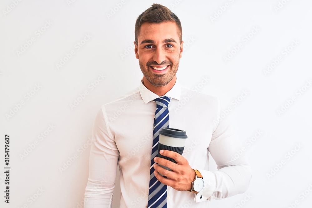 Young handsome business man drinking take away coffee over isolated background with a happy face standing and smiling with a confident smile showing teeth Young handsome business man drinking take away coffee over isolated background with a happy face standing and smiling with a confident smile showing teeth
