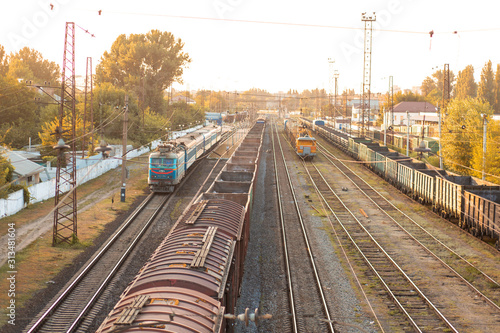 Railway. Freight wagons carrying different loads. Heavy industry concept