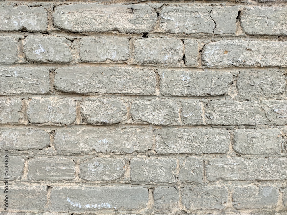 Old brick wall. The texture of a white brick wall. Old brick wall. The texture of a white brick wall.