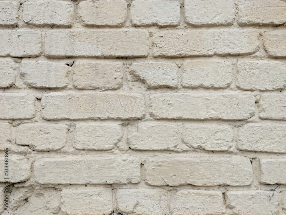 Old brick wall. Texture of a white, painted brick wall. Old brick wall. Texture of a white, painted brick wall.