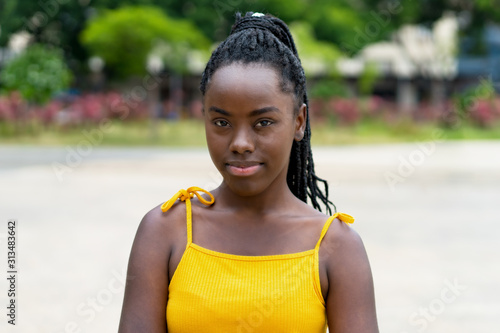 Portrait of  african american woman with dreadlocks photo