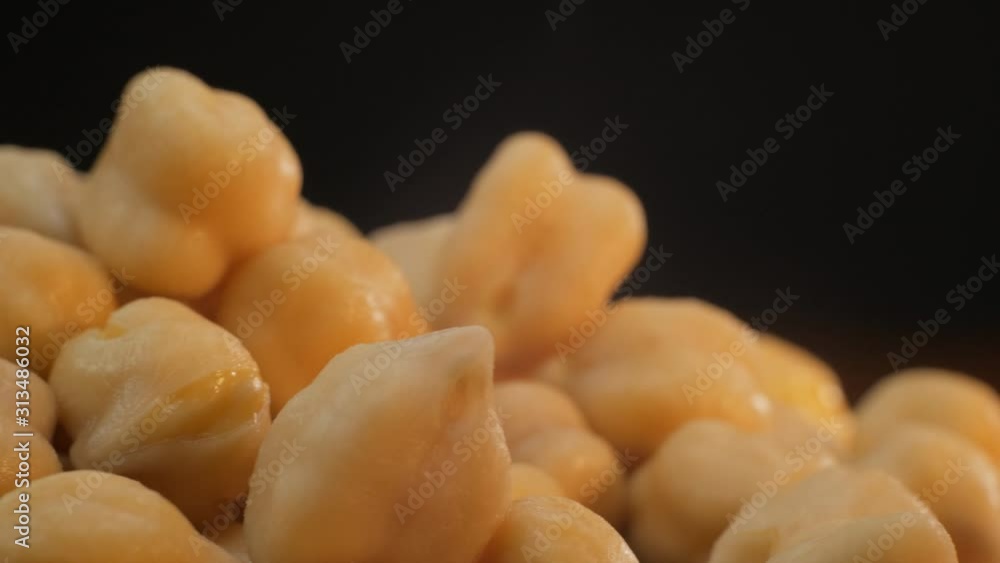Closeup of rotating chickpeas. A bunch of bean grains. Closeup of rotating chickpeas. A bunch of bean grains.