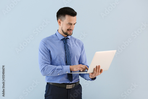 Portrait of young businessm...