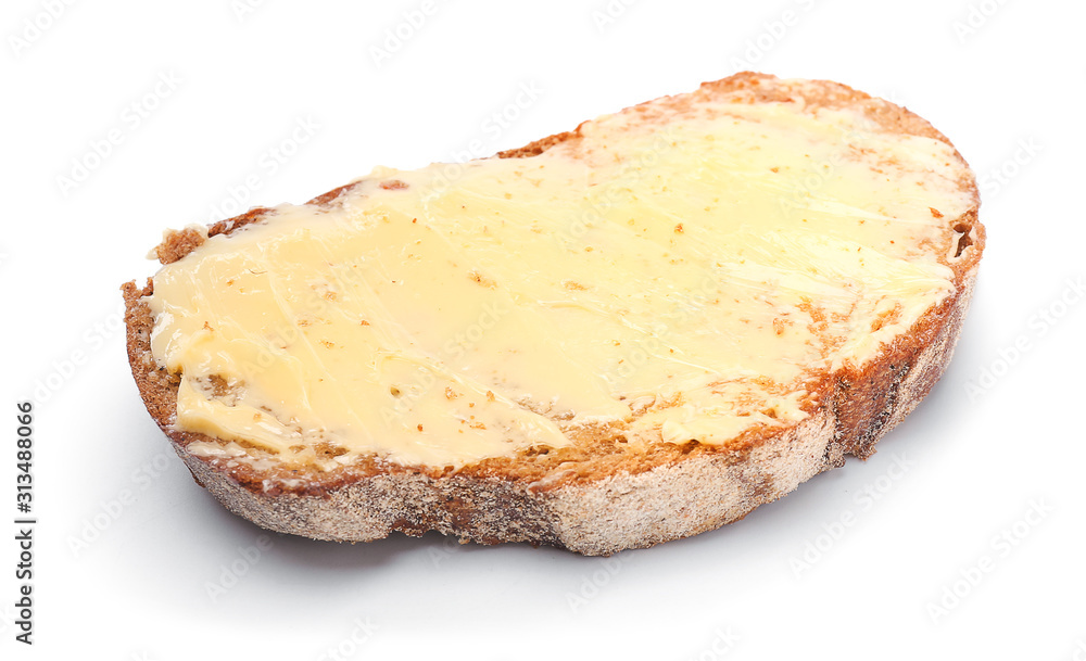 Slice of bread with butter on white background Slice of bread with butter on white background